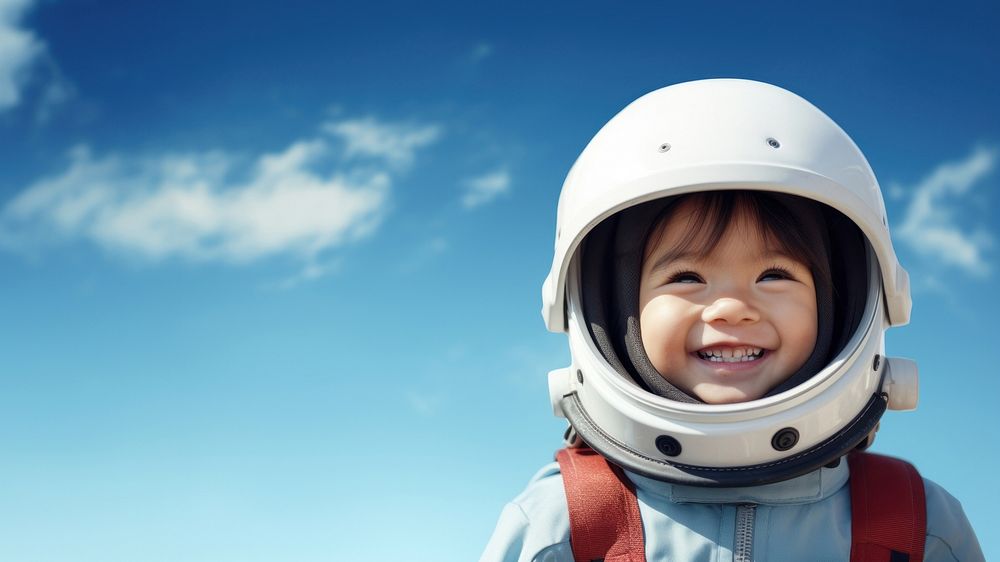 Astronaut smiling helmet child. AI generated Image by rawpixel.