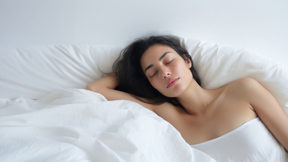 Sleeping blanket adult woman. AI generated Image by rawpixel.