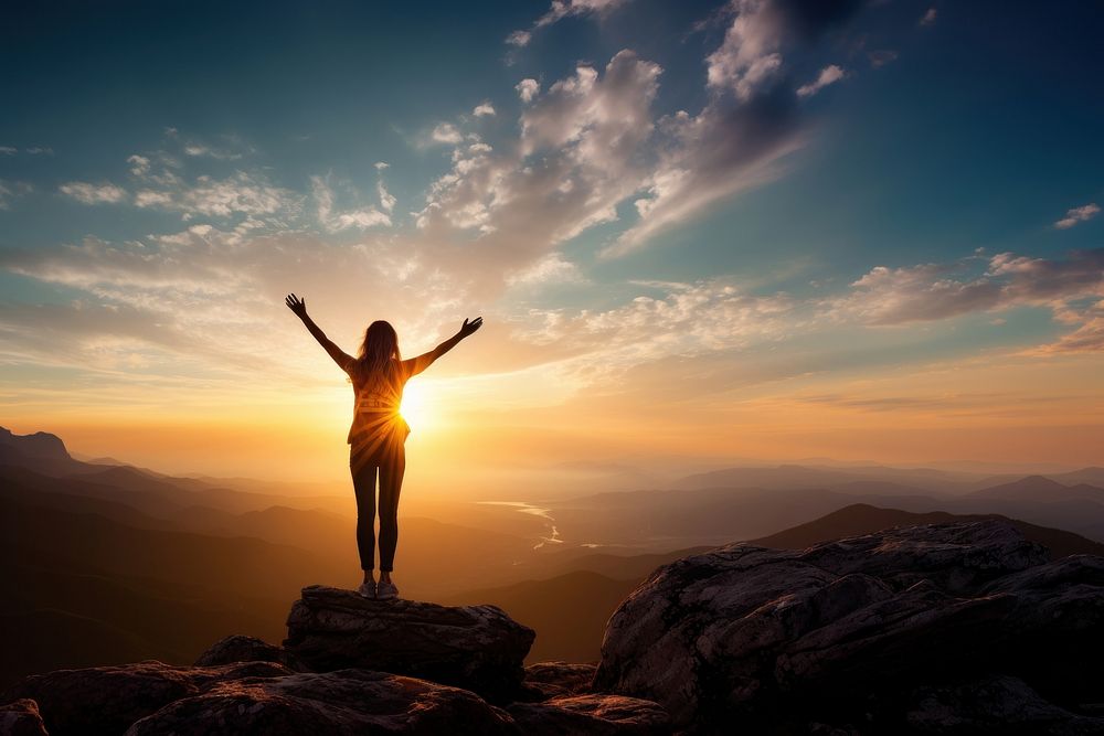 Carefree woman standing edge mountain | Premium Photo - rawpixel