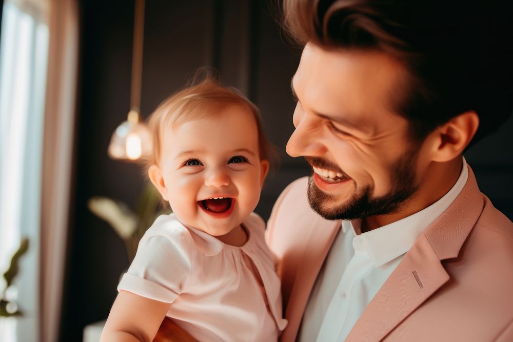 Man holding adorable baby laughing smiling adult. AI generated Image by rawpixel.