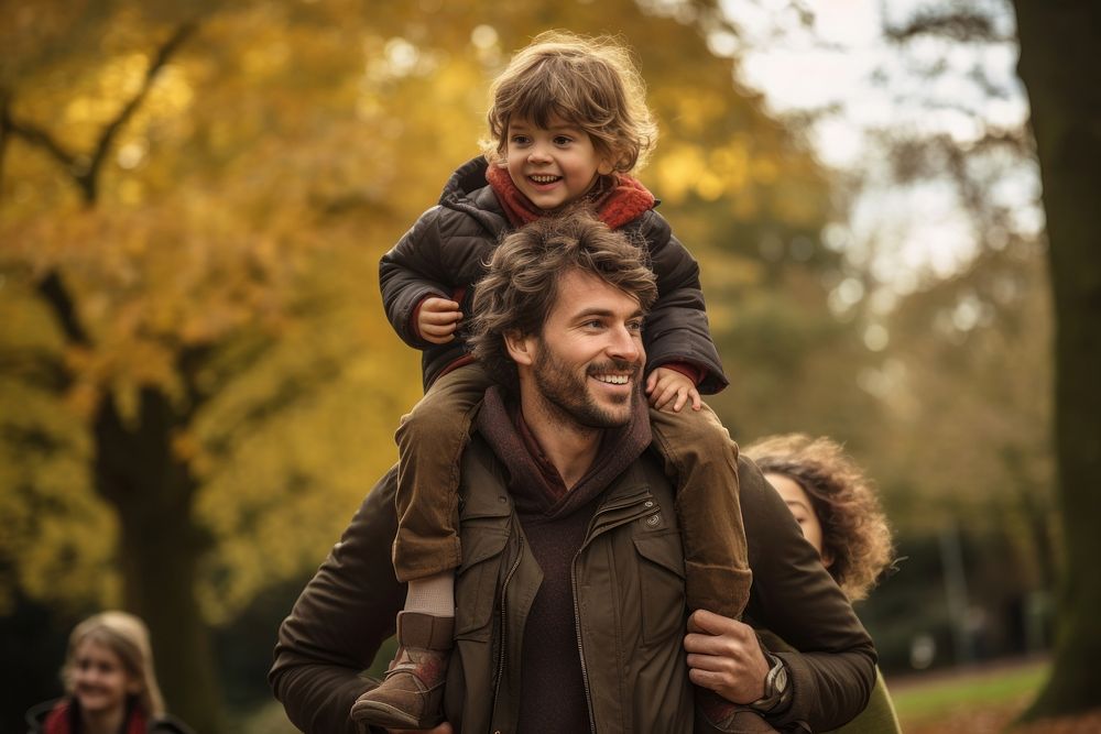 Parents Carrying Son carrying laughing portrait. 