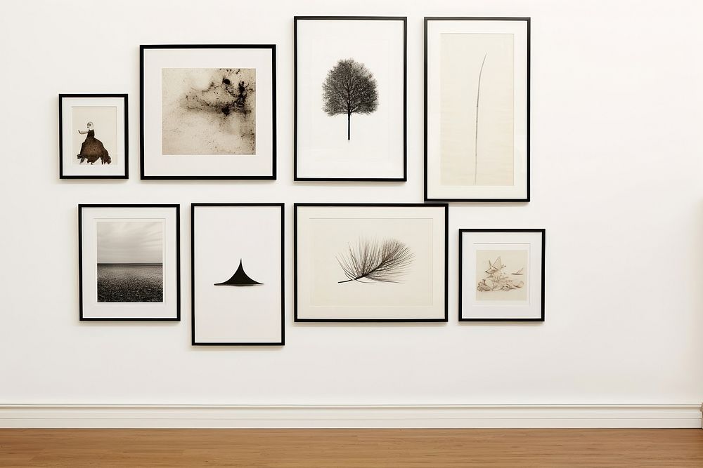 Picture frames on a wall. AI generated Image by rawpixel.