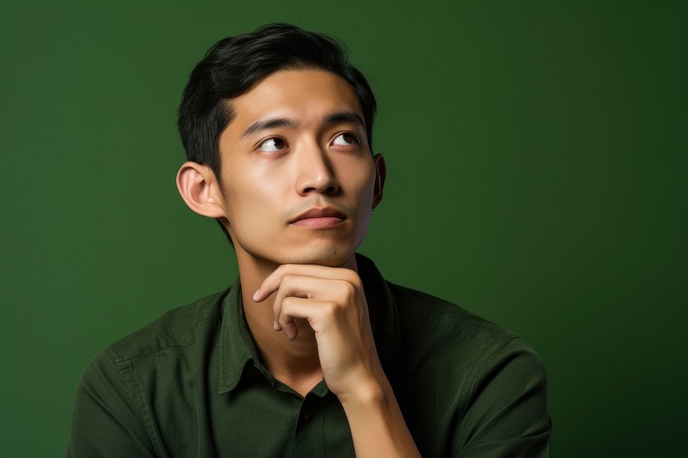 Asian men portrait green photo. AI generated Image by rawpixel.