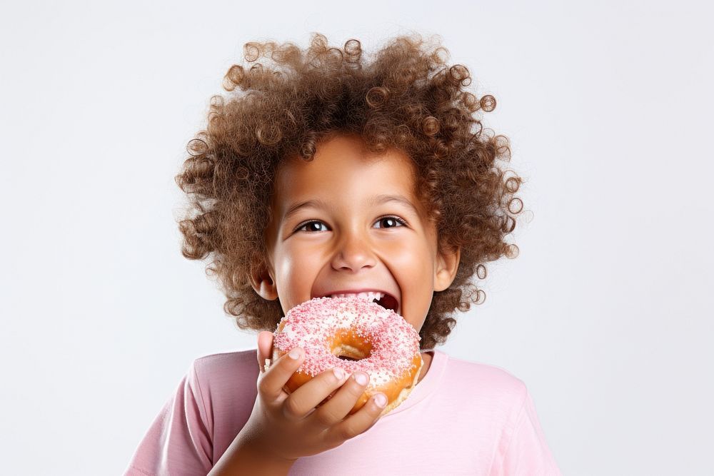 Kid eat donuts child eating biting. AI generated Image by rawpixel.