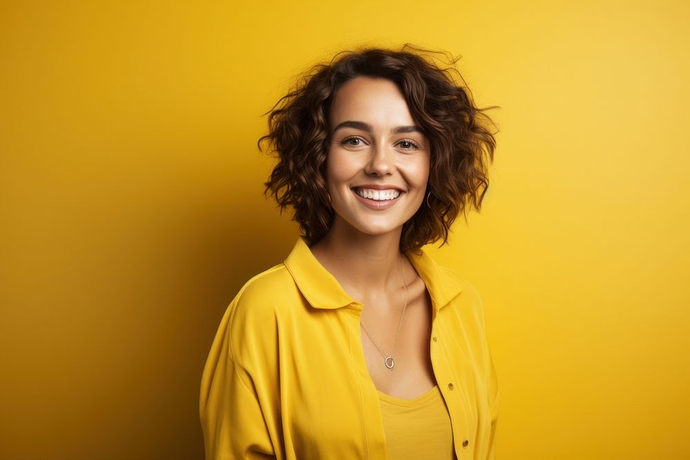 Young woman portrait smiling yellow. AI generated Image by rawpixel.