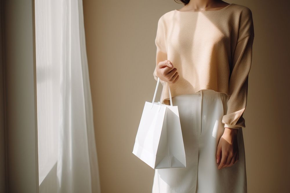 Woman holding shopping bags handbag adult woman. AI generated Image by rawpixel.