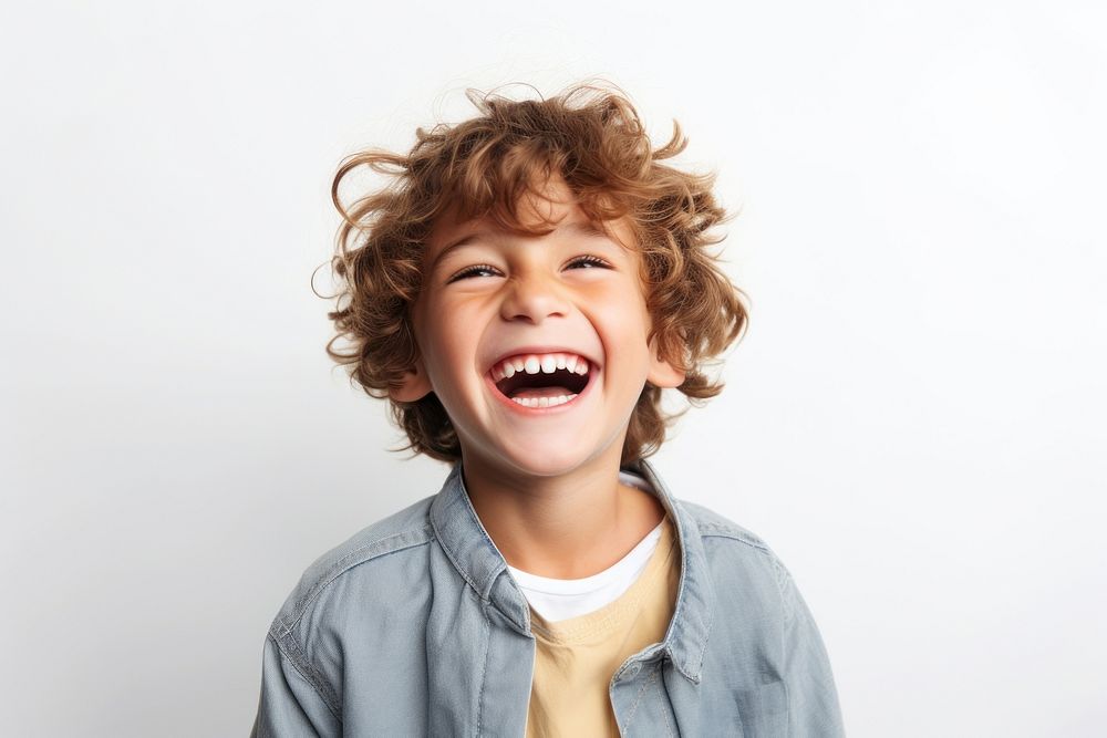A young boy laughing smile happy. AI generated Image by rawpixel.