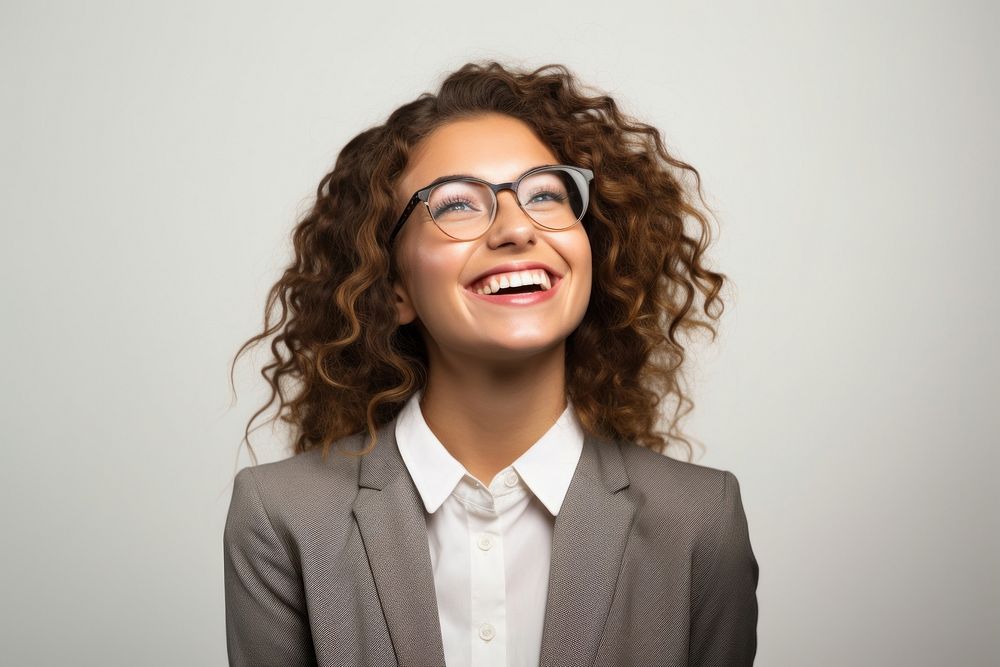 Young happy business woman laughing glasses smile. AI generated Image by rawpixel.