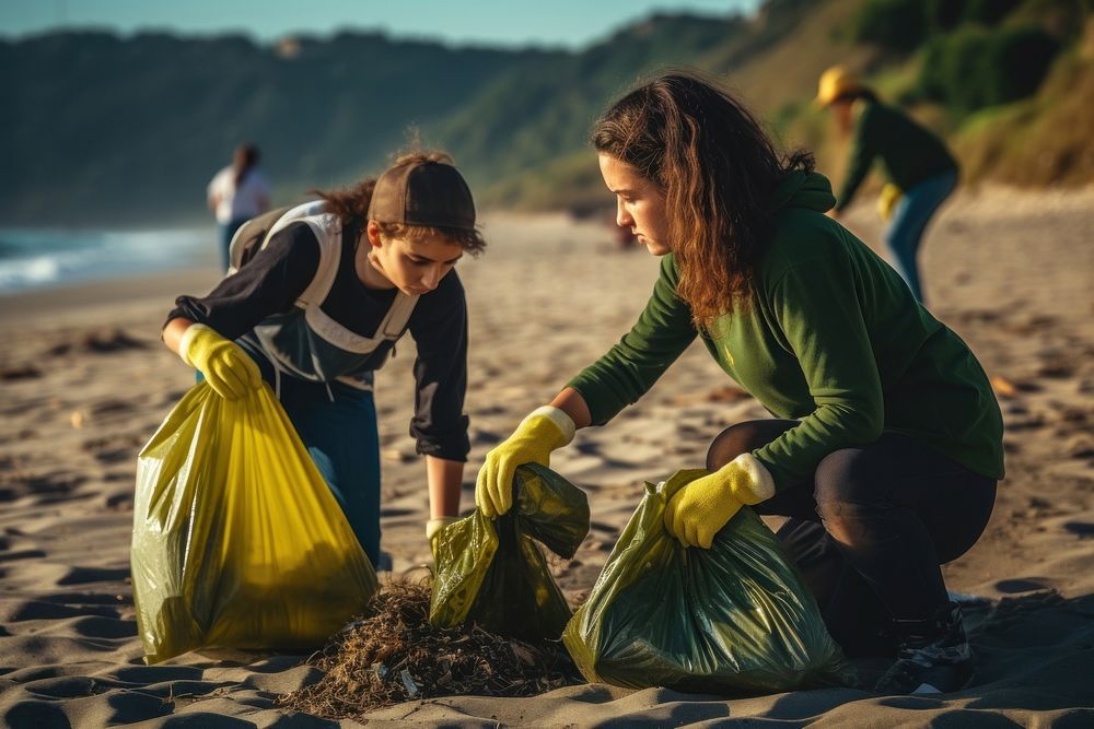 Volunteer beach cleaning outdoors. AI generated Image by rawpixel.