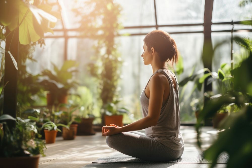 Lotus position sitting plant yoga. AI generated Image by rawpixel.