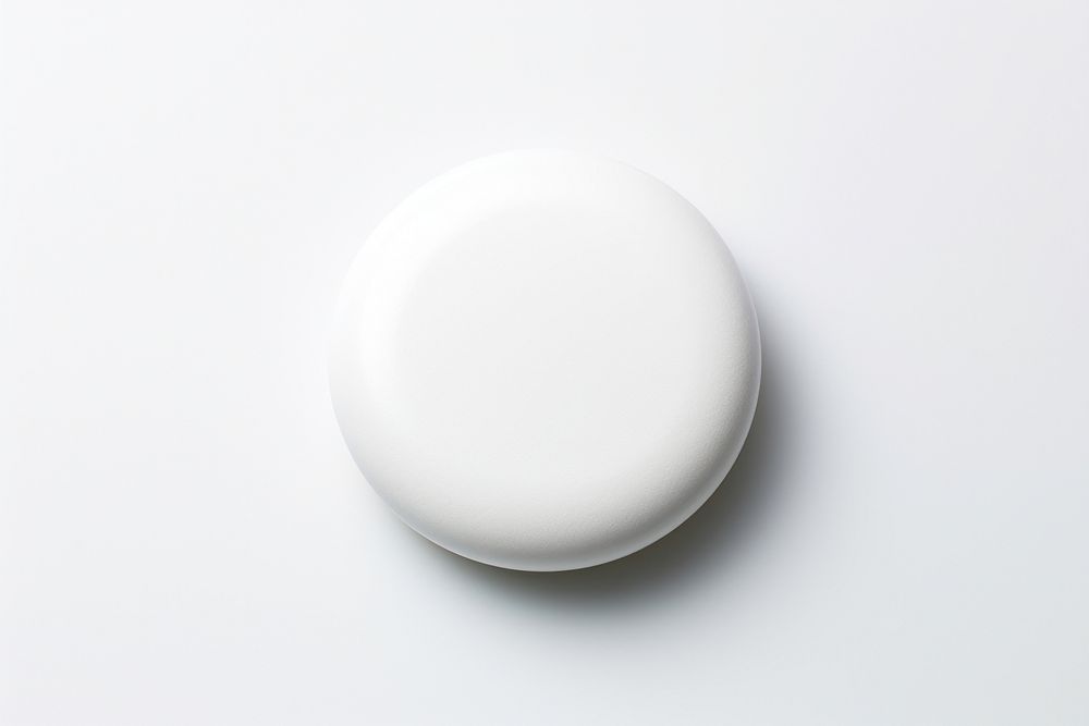 A pill white white background simplicity. AI generated Image by rawpixel.