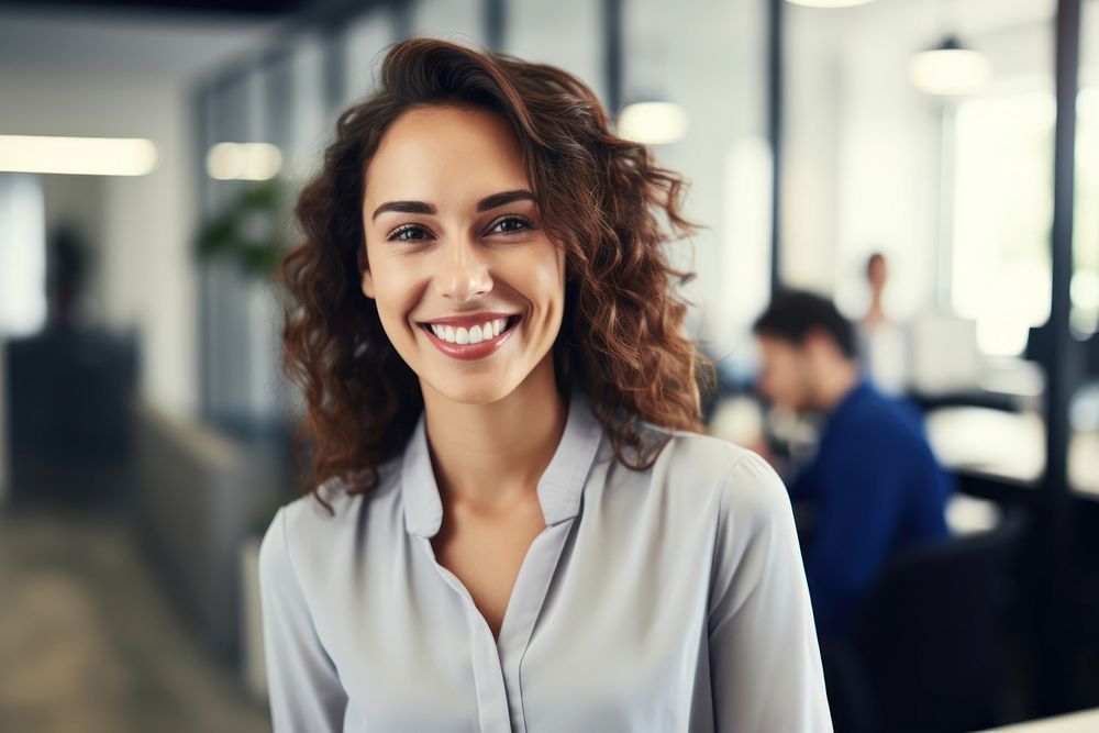 Office worker smiling female adult smile. AI generated Image by rawpixel.