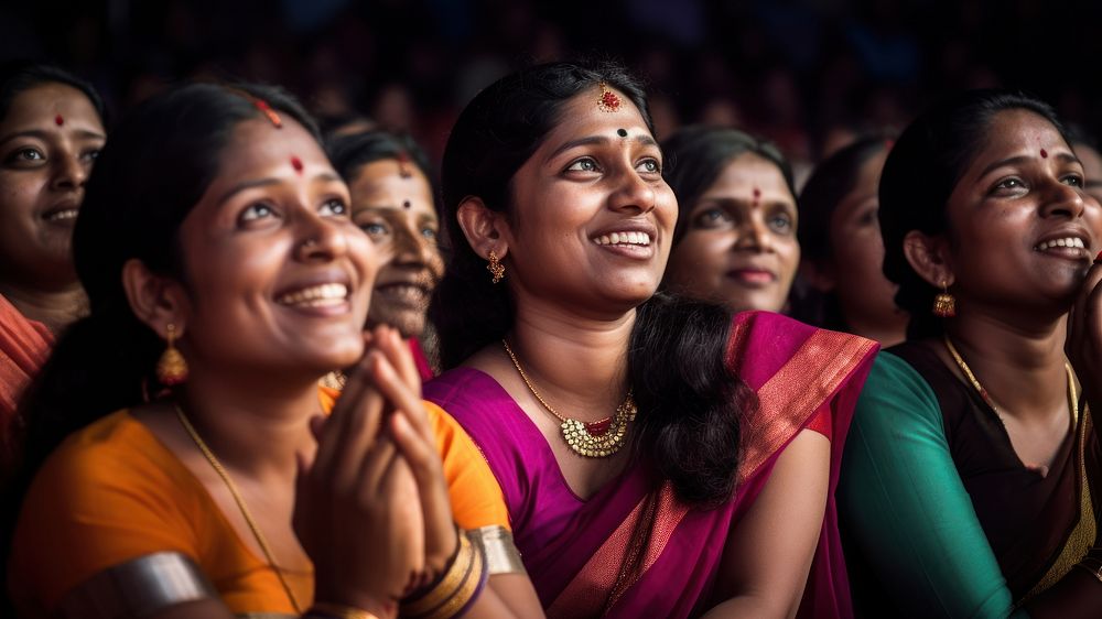 Photography of Unusual looking 36yo south Indian women speacking watching concert. AI generated Image by rawpixel. 