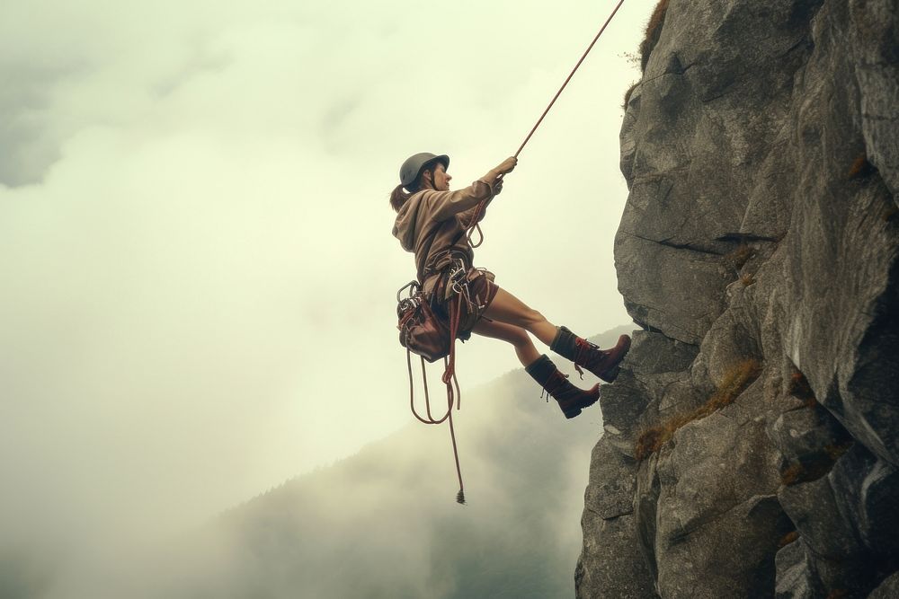 Woman abseiling recreation adventure climbing. AI generated Image by rawpixel.