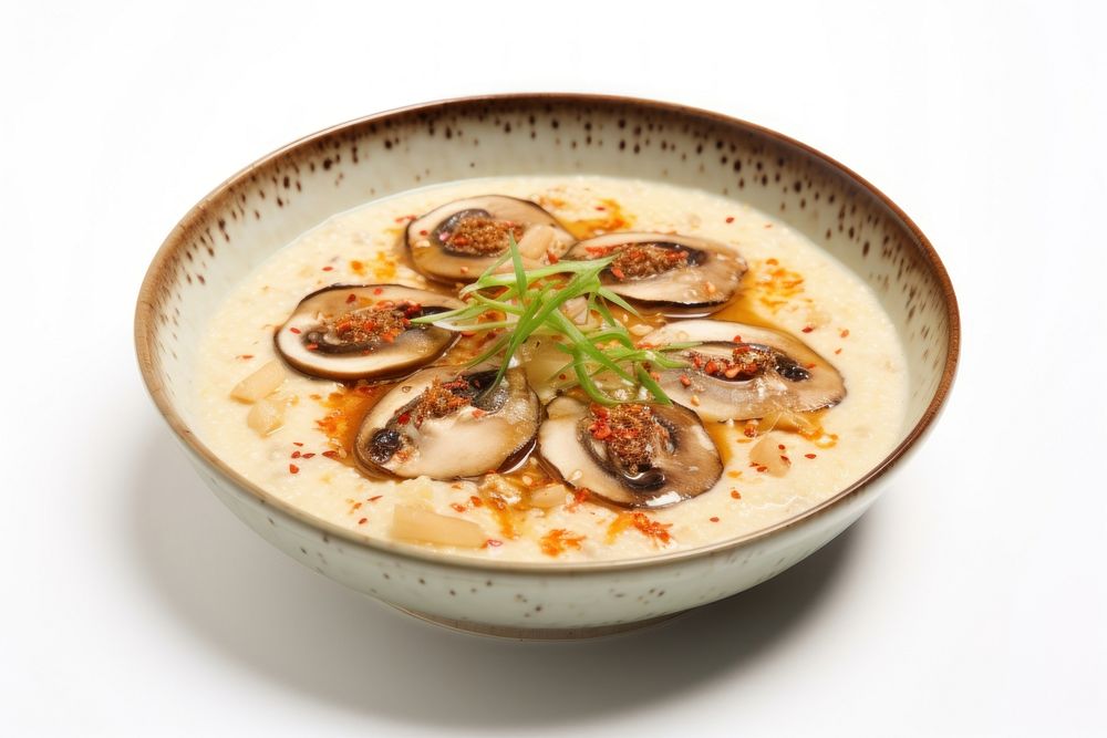 Abalone porridge dish seafood plate meal. AI generated Image by rawpixel.