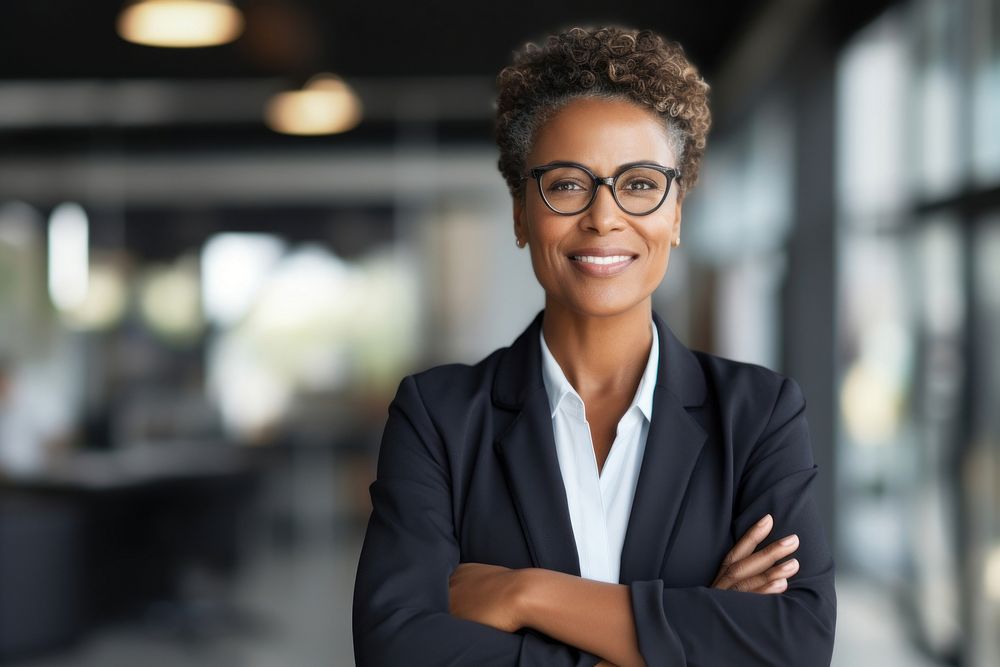 Middle aged black business woman smiling arms crossed glasses adult smile. AI generated Image by rawpixel.