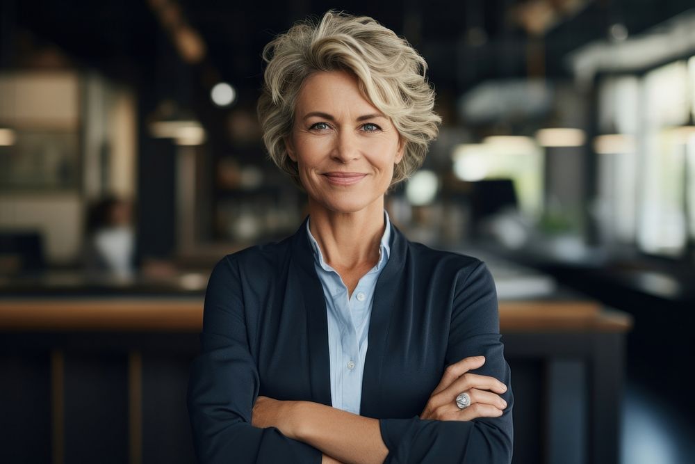 Middle aged business woman smiling arms crossed adult smile entrepreneur. AI generated Image by rawpixel.