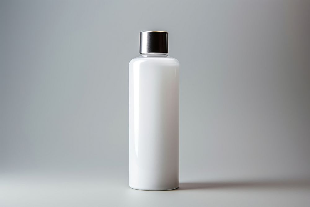 Skincare bottle cylinder white drinkware. AI generated Image by rawpixel.