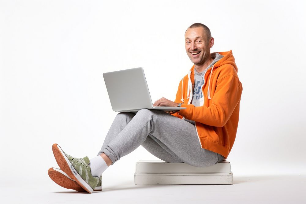 Man use laptop sweatshirt computer sitting. AI generated Image by rawpixel.
