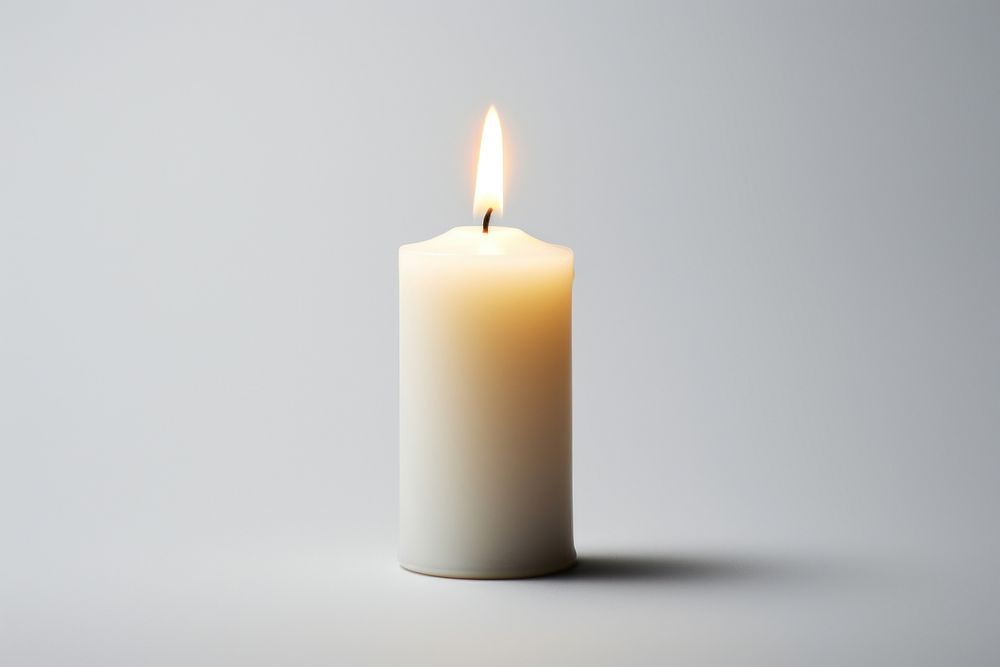 Candle white spirituality illuminated. AI generated Image by rawpixel.