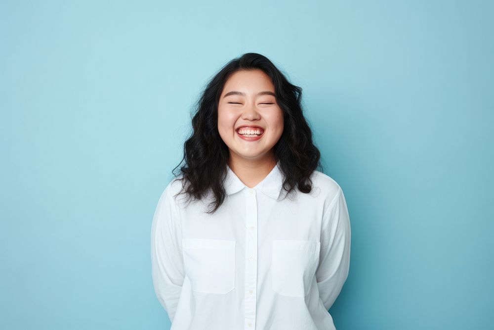 Teen half-asian woman smile laughing white. 