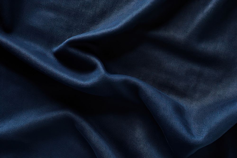 Dark blue fabric texture  crumpled wrinkled. 