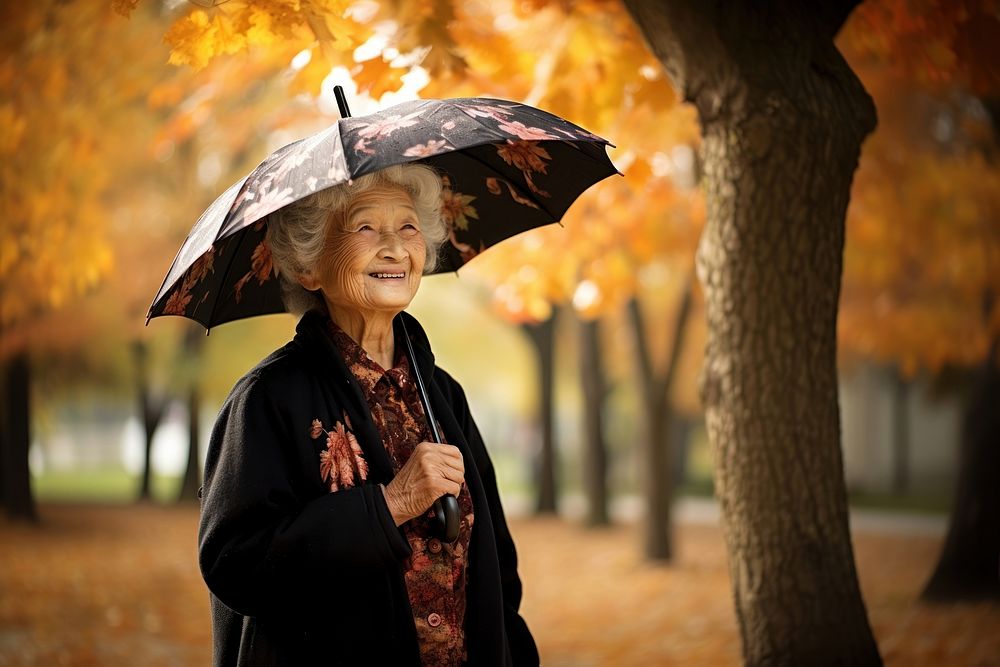 Old woman holding autumn adult. AI generated Image by rawpixel.