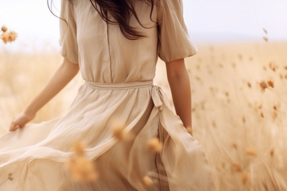 Photo of woman in wildflower. 