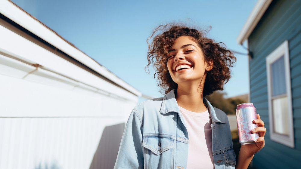 Portrait photo of a happy woman holding aluminum can looking at out side on minimal home. AI generated Image by rawpixel.