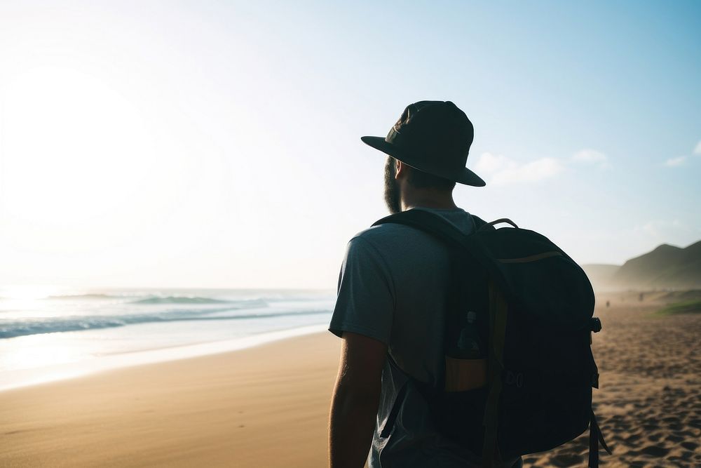 Backpacker man beach adult photo. AI generated Image by rawpixel.