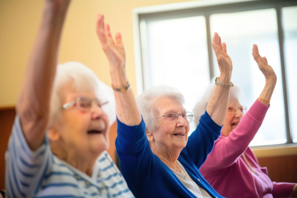 Happy Elderly women raising hands female adult woman. AI generated Image by rawpixel.