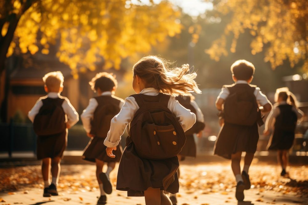 Students running walking autumn child. AI generated Image by rawpixel.