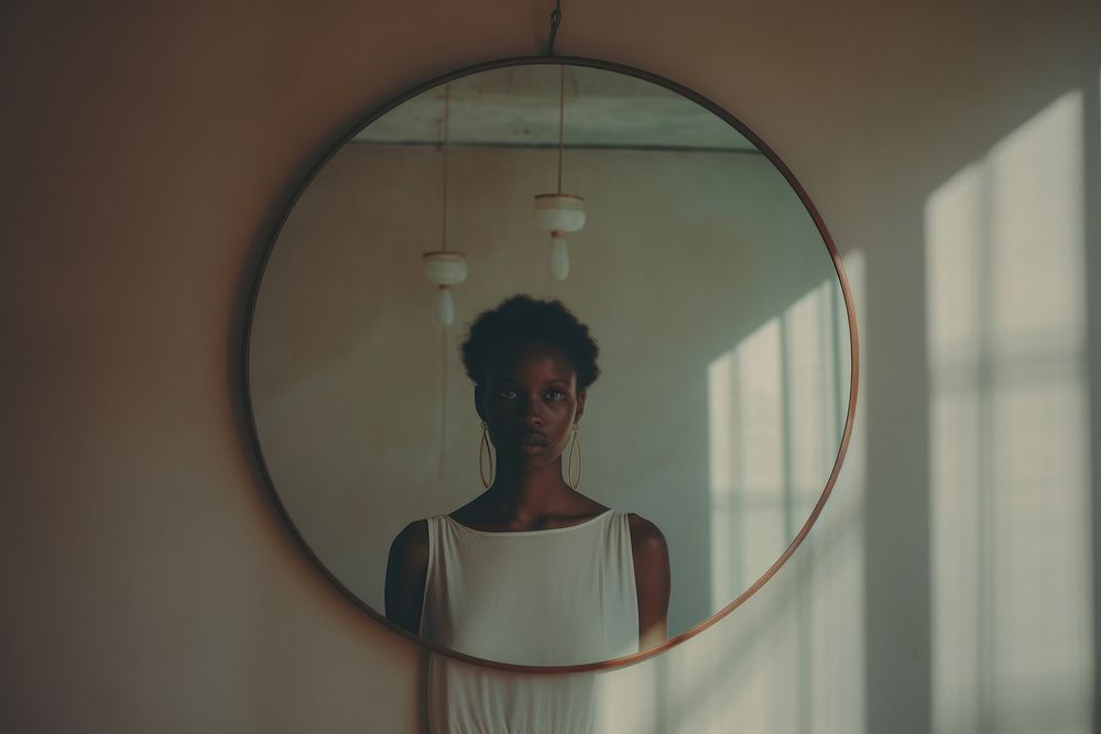 African american photography mirror contemplation. AI generated Image by rawpixel.