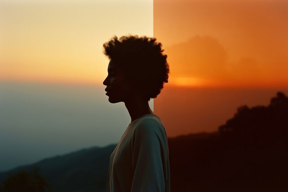 African american woman contemplation backlighting tranquility. 