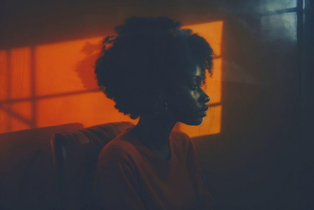 African american woman contemplation backlighting architecture. AI generated Image by rawpixel.