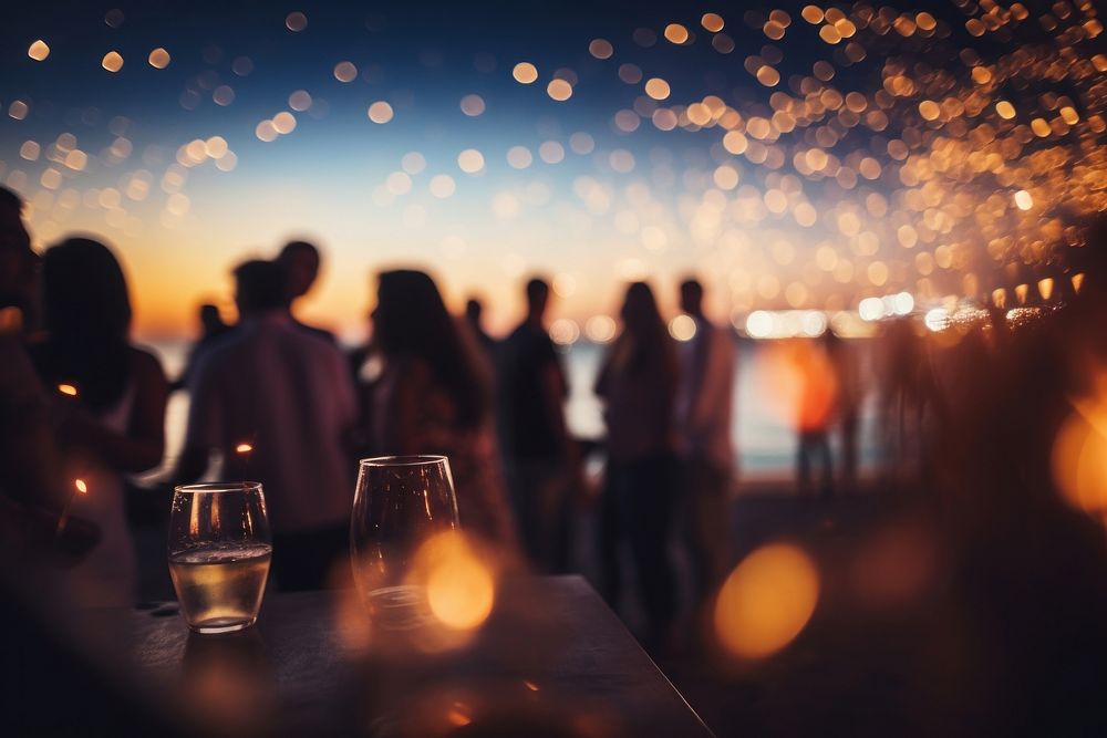 A small seaside party defocused lighting outdoors. 