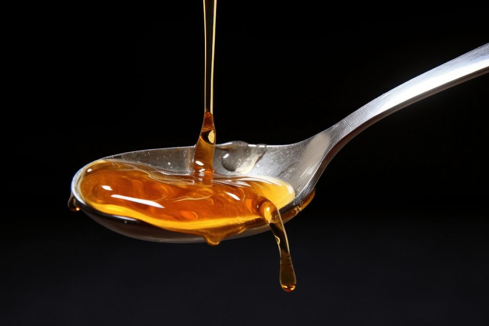 Medicine syrup pouring spoon refreshment. AI generated Image by rawpixel.