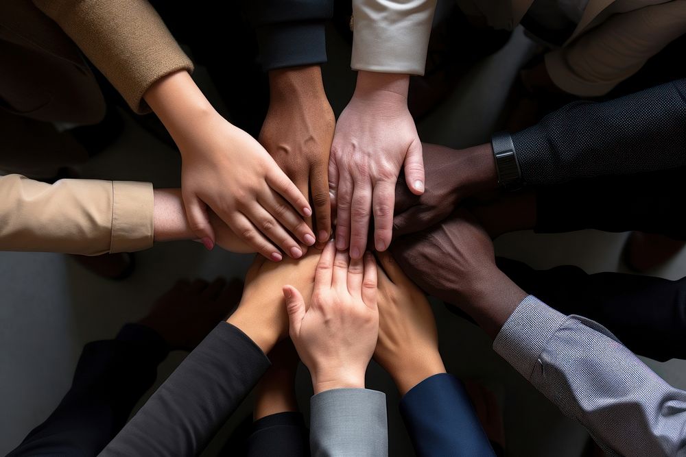 Teamwork put together few hands photo. AI generated Image by rawpixel.