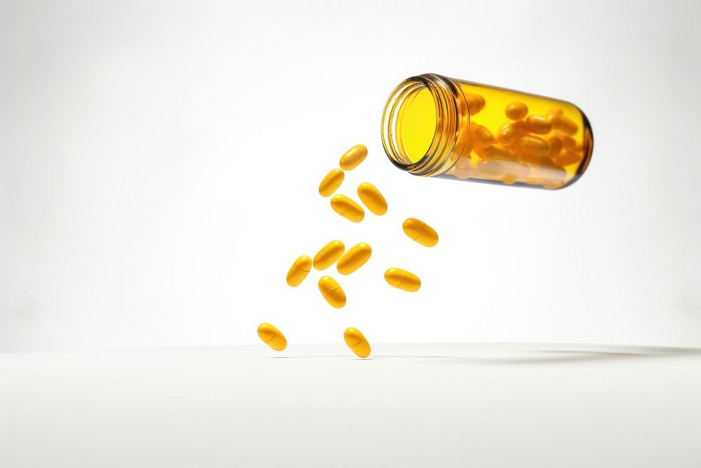 Pills yellow pills bottle dynamic. AI generated Image by rawpixel.