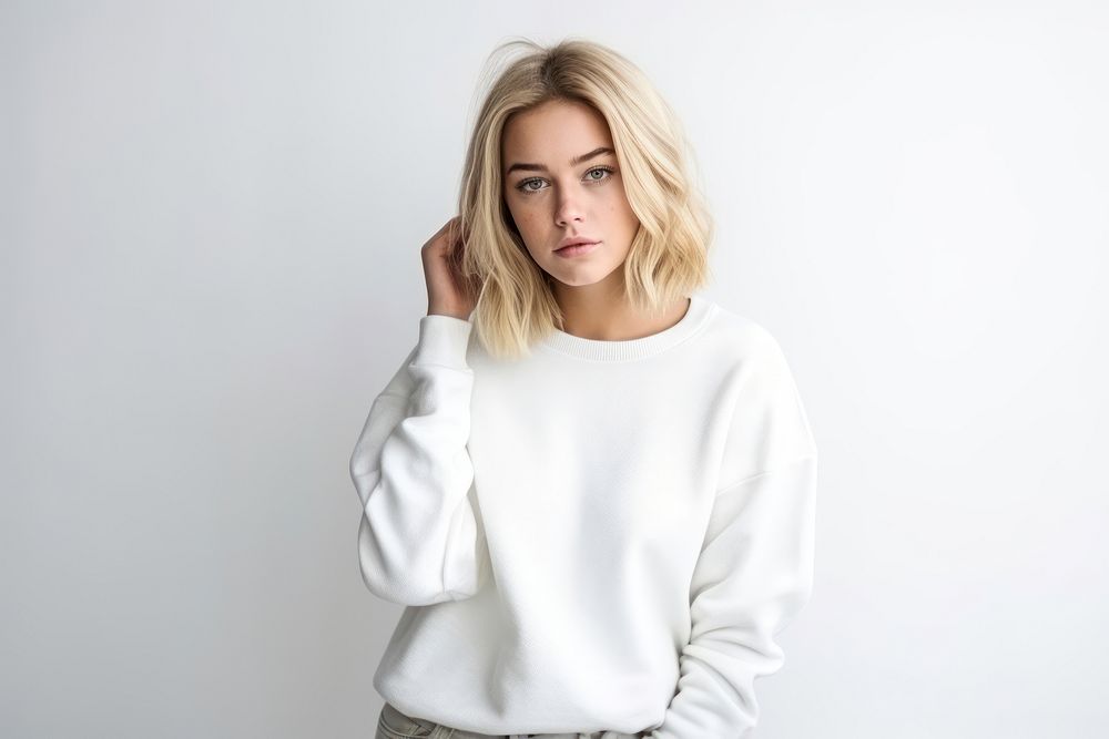 Caucasian woman sweatshirt portrait blonde. AI generated Image by rawpixel.