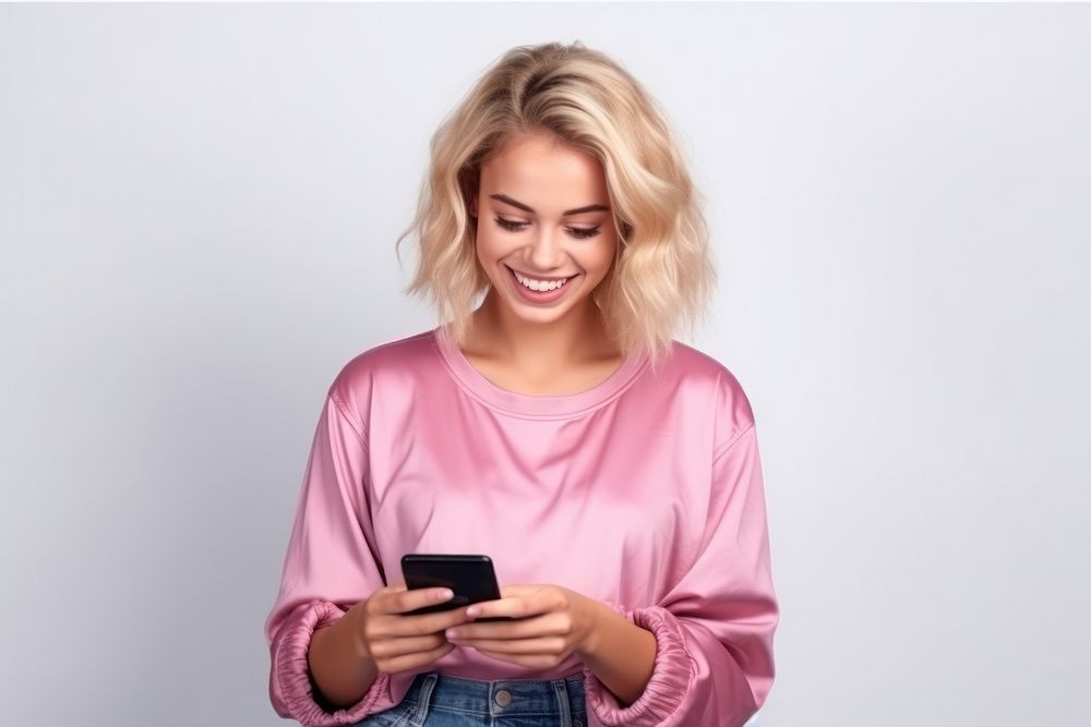 Young blonde woman adult phone pink. AI generated Image by rawpixel.
