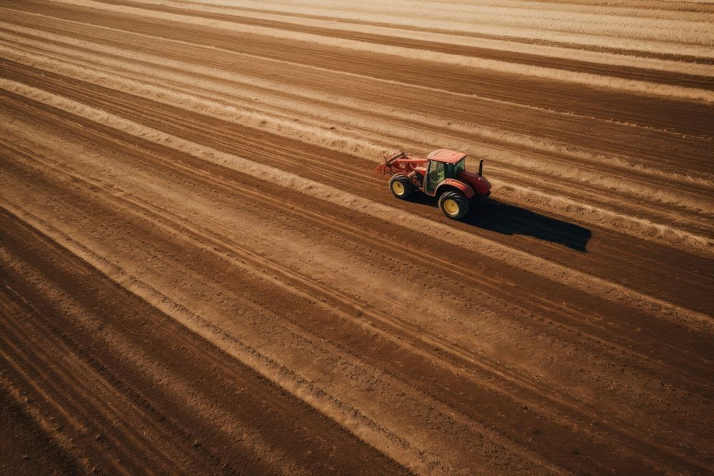 Red Tractor cultivating field outdoors tractor nature. AI generated Image by rawpixel.