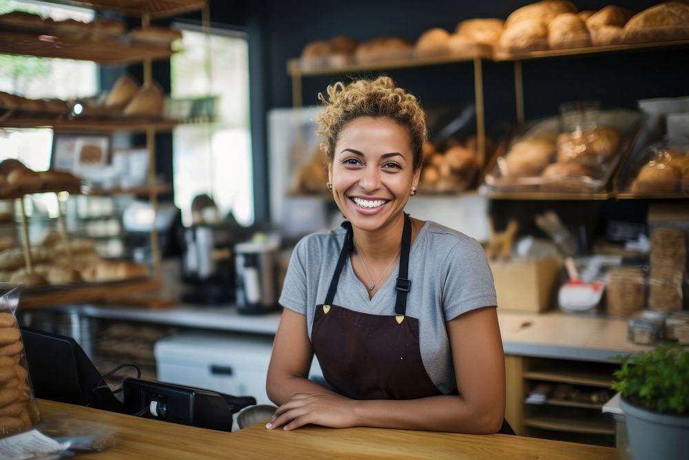 Female business owner smiling working bread. AI generated Image by rawpixel.