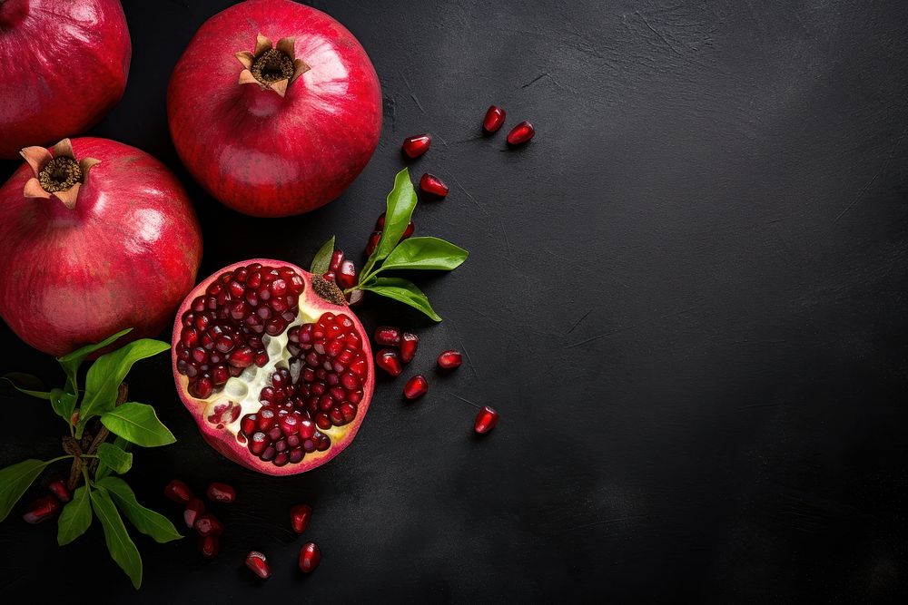 Pomegranates fruit apple plant. AI generated Image by rawpixel.