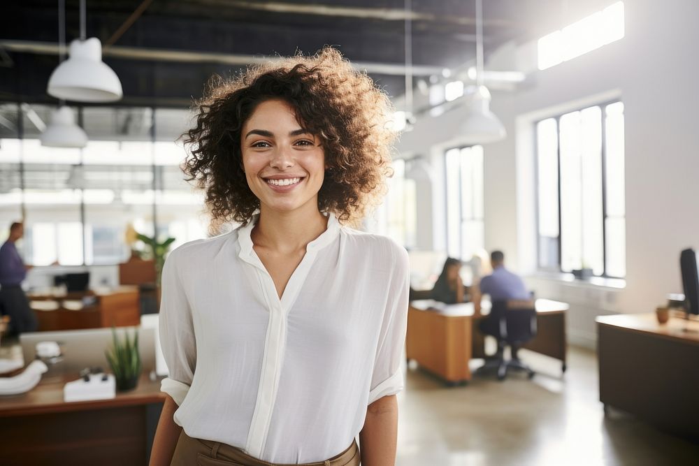 Happy woman smiling standing portrait office. 