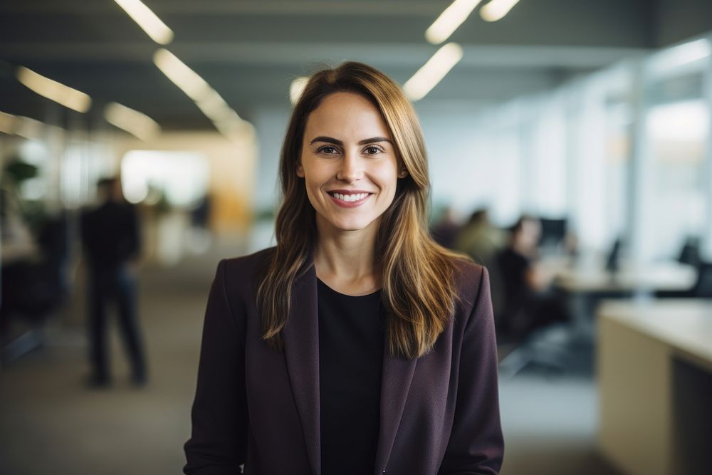 Happy woman smiling portrait standing office. 