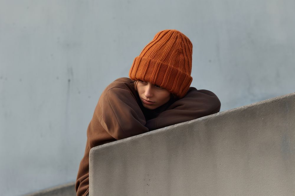 Beanie brown contemplation homelessness. AI generated Image by rawpixel.