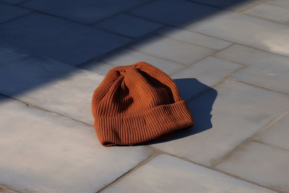 Beanie brown headwear clothing. AI generated Image by rawpixel.