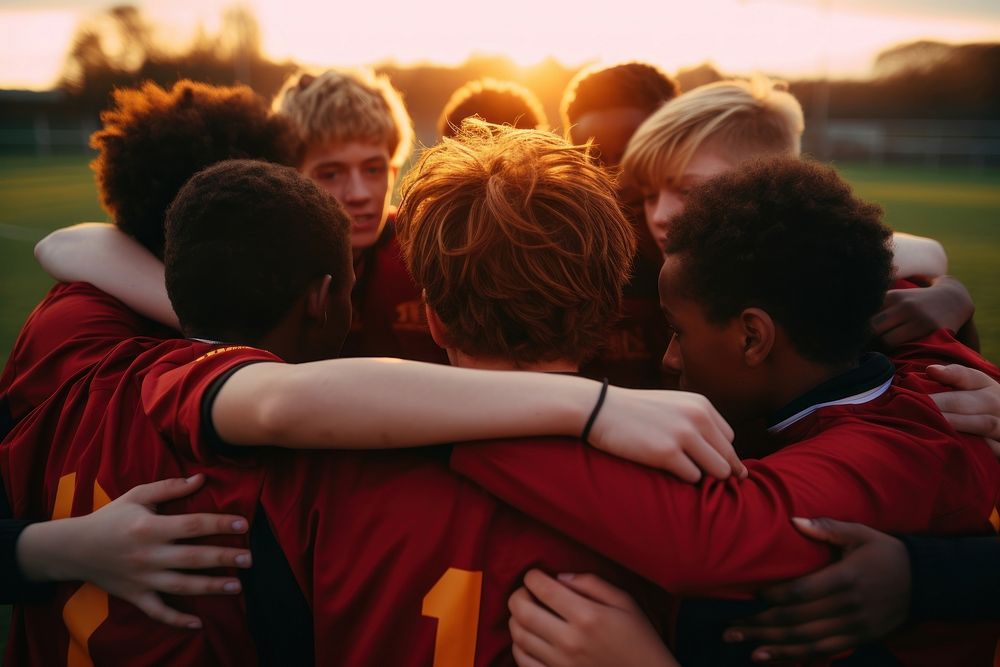 Football players huddle adult togetherness. AI generated Image by rawpixel.