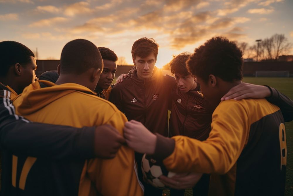 Football players adult togetherness cooperation. AI generated Image by rawpixel.